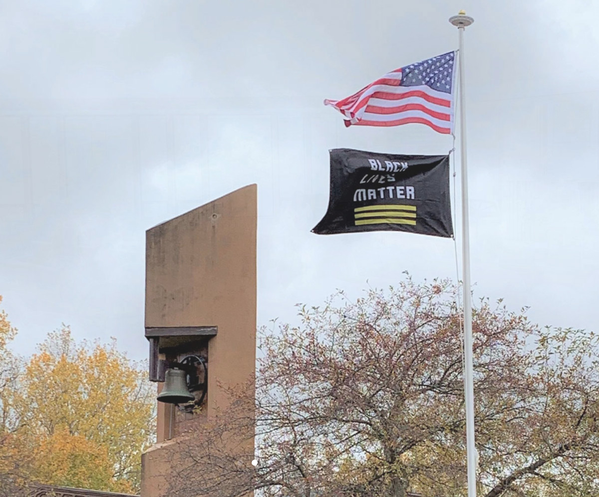 Black Lives Matter flag flying at the Unitarian Universalist Congregation of Flint